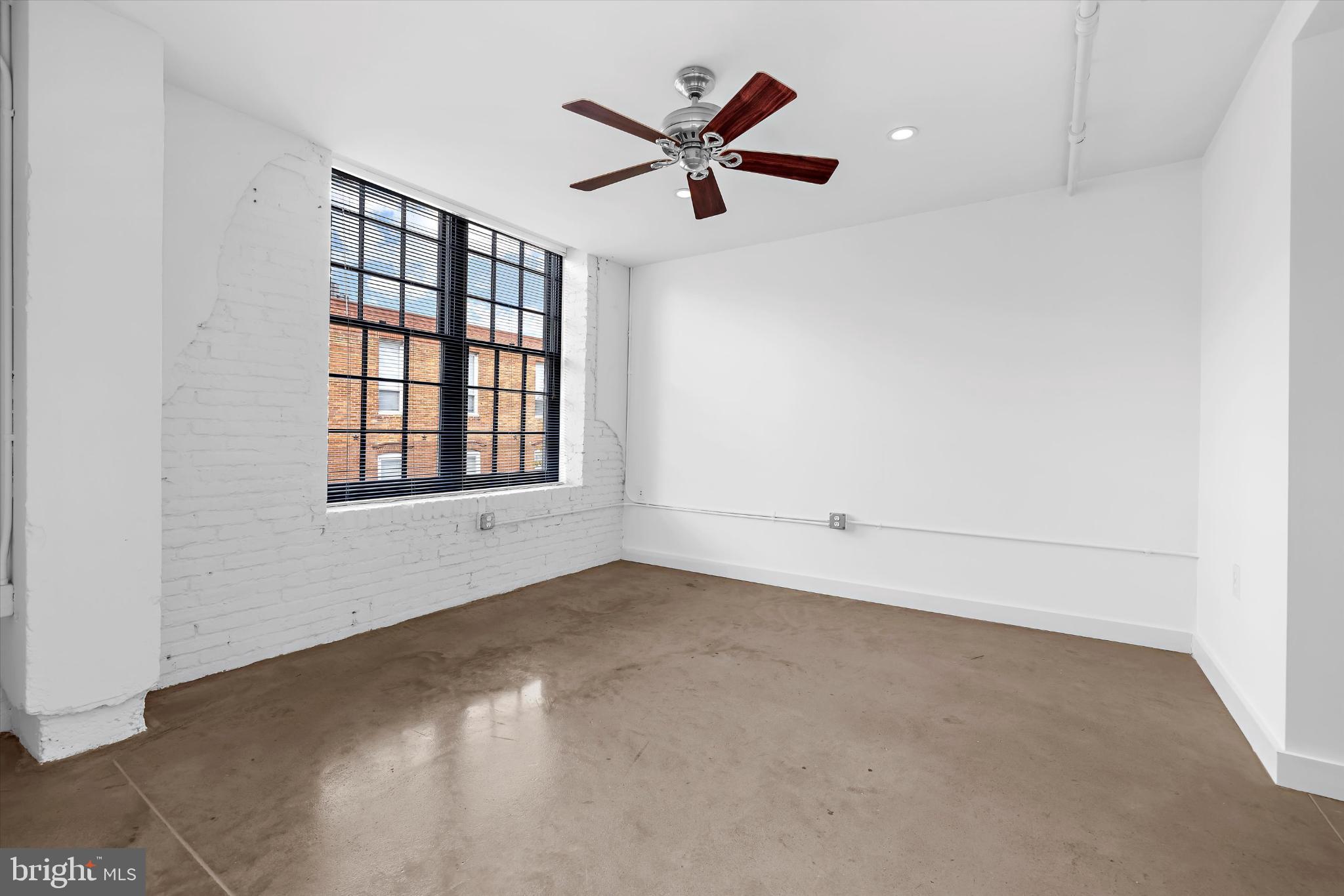 1220 Bank Street, Unit 303 Baltimore, MD 21202 - Photo 21 of 50 Main level bedroom with ensuite