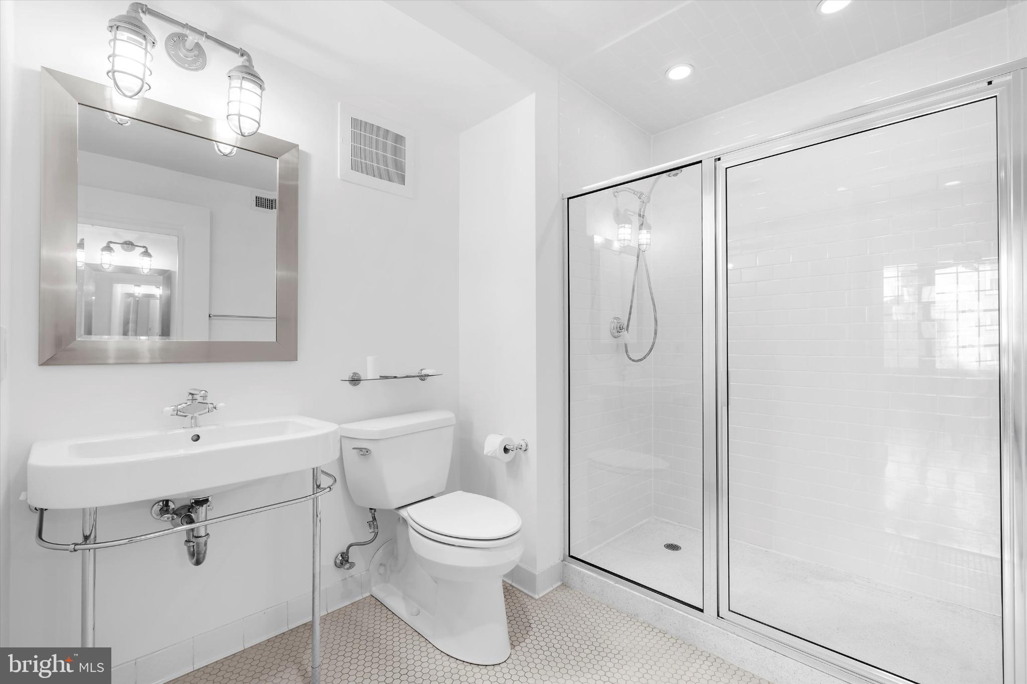 1220 Bank Street, Unit 303 Baltimore, MD 21202 - Photo 26 of 50 Main level ensuite bathroom