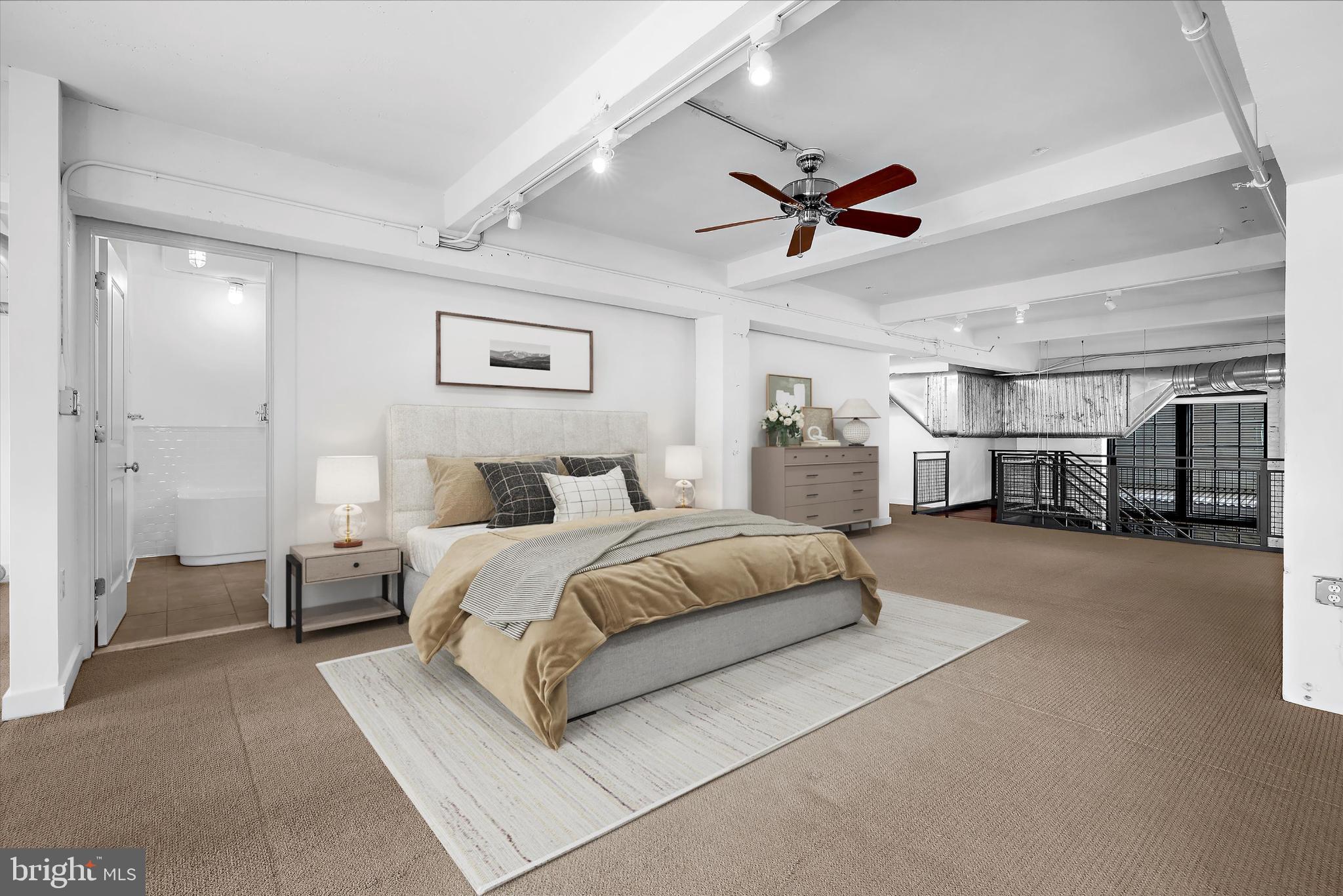 1220 Bank Street, Unit 303 Baltimore, MD 21202 - Photo 29 of 50 Virtually staged loft bedroom