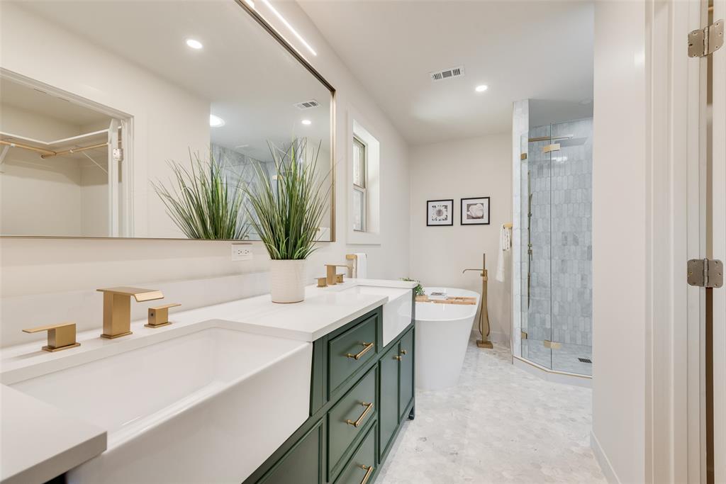 3106 Sharpview Lane Dallas, TX 75228 - Photo 23 of 33 a bathroom with a sink double vanity granite and a mirror