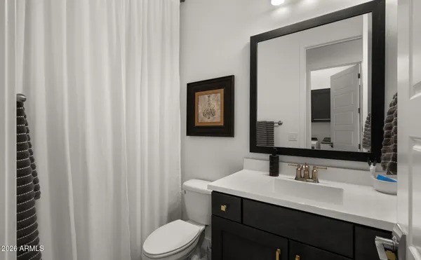 a view of an house with backyard space and garden