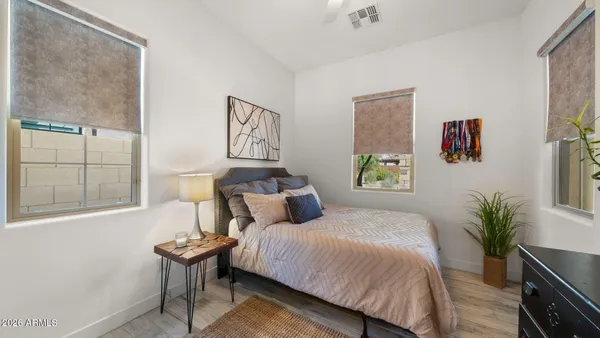 a view of a sink and cabinets in a room