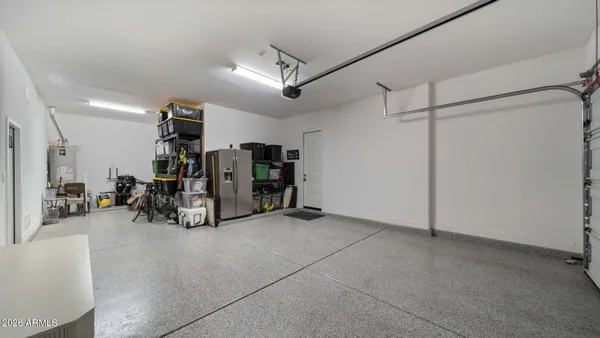 a bathroom with a double vanity sink double vanity granite tub and shower