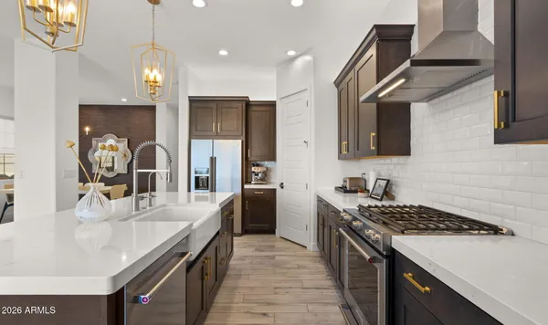 a view of a dining room with furniture and window