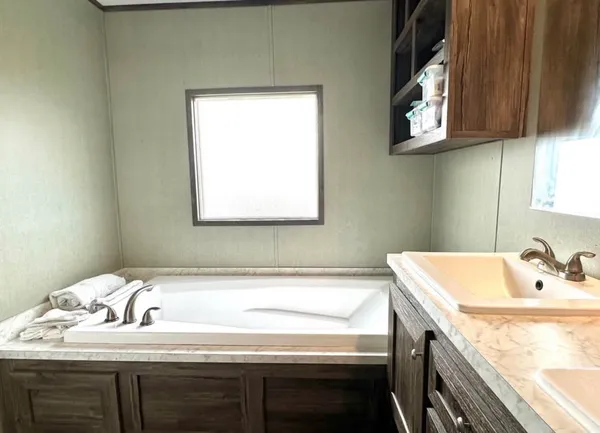 a bathroom with a sink and a bathtub