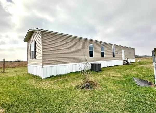 a view of a backyard with a garden