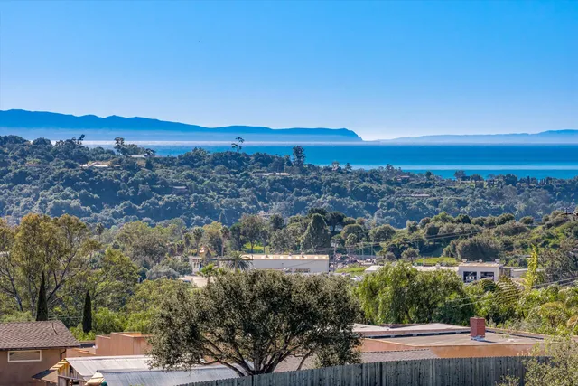 an aerial view of residential building and city view