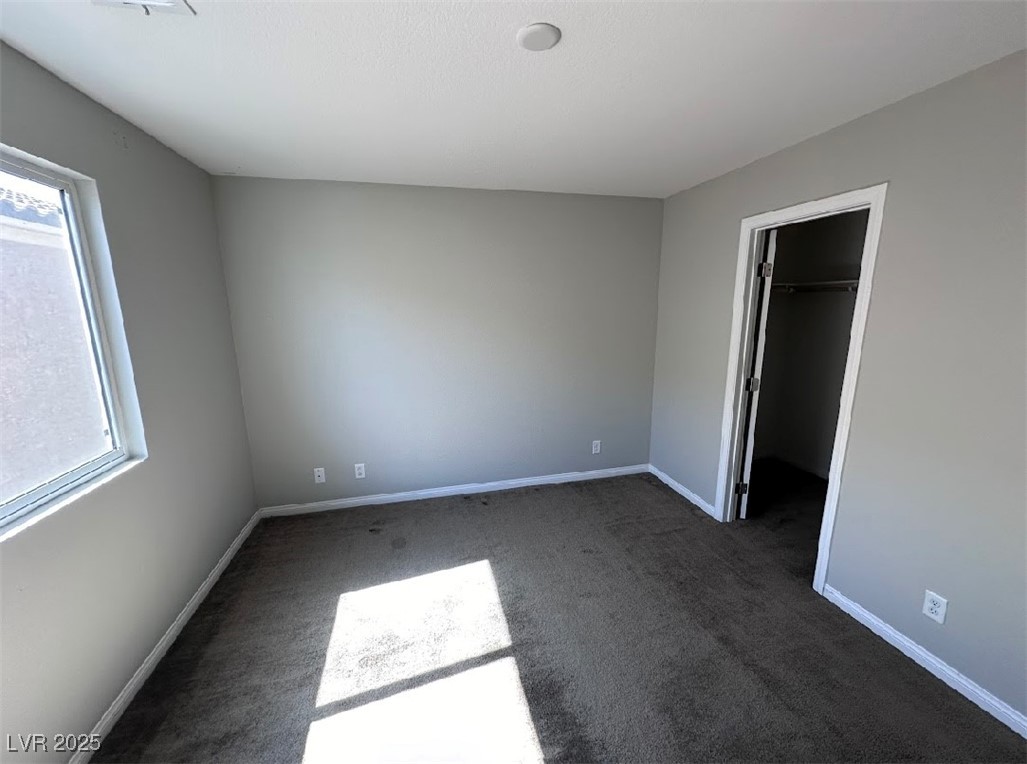 4620 Amberley Ridge Avenue Las Vegas, NV 89115 - Photo 15 of 24 2nd bedroom with walk in closet