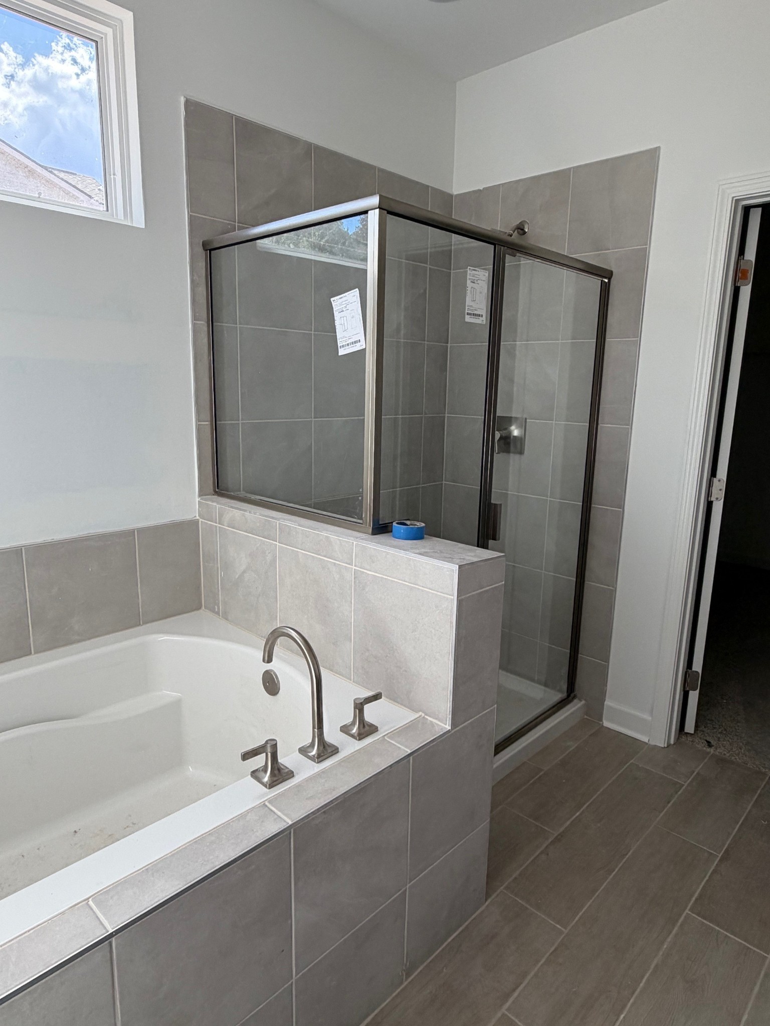 2367 Beverly Gail Road Pleasant View, TN 37146 - Photo 3 of 42 a bathroom with a bathtub and a shower