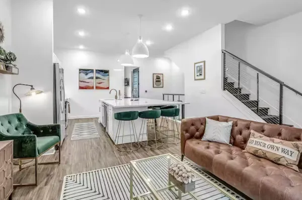 a living room with furniture and a table