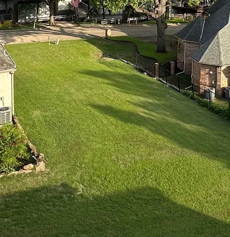 a view of a swimming pool with an outdoor space and seating area