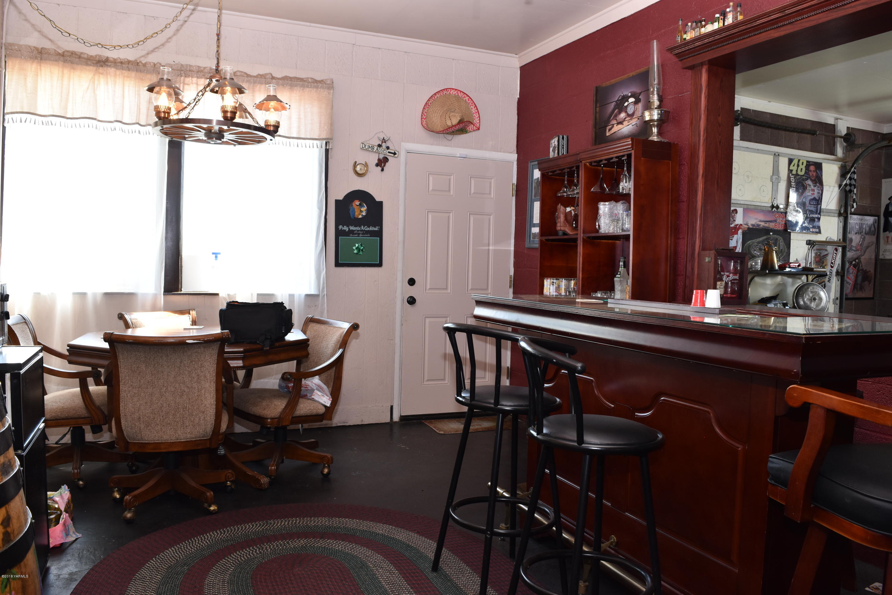 2000 Hiland Road Tieton, WA 98947 - Photo 12 of 16 a view of a dining room with furniture and chandelier