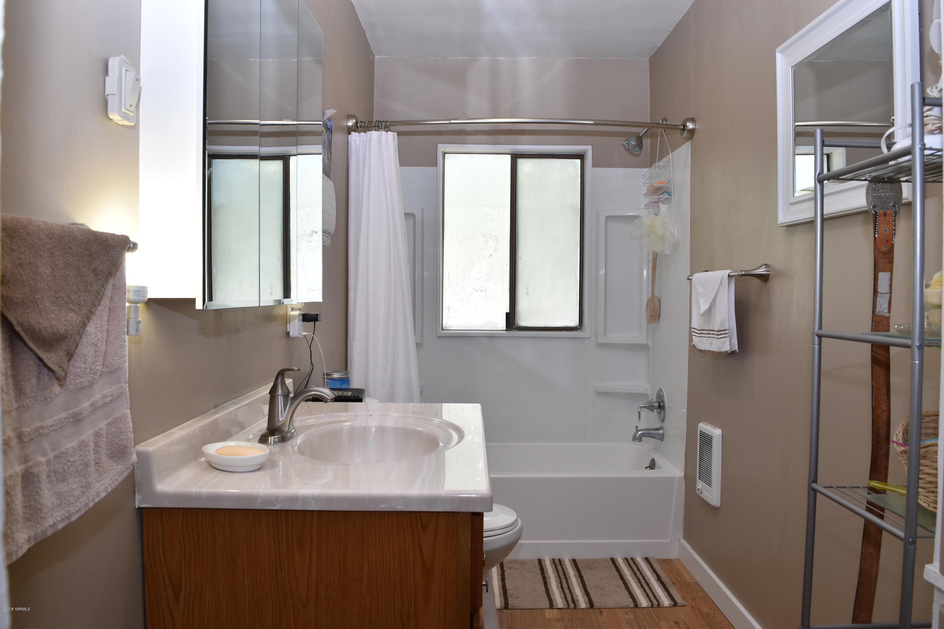 2000 Hiland Road Tieton, WA 98947 - Photo 8 of 16 a bathroom with a sink and a mirror