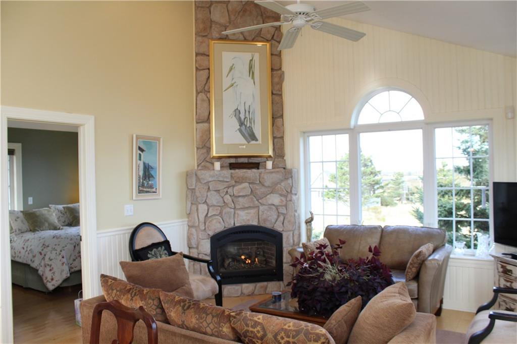 98 Carrying Place Cove Road Lubec, ME 04652 - Photo 22 of 35 Gas fire place easily heats the...