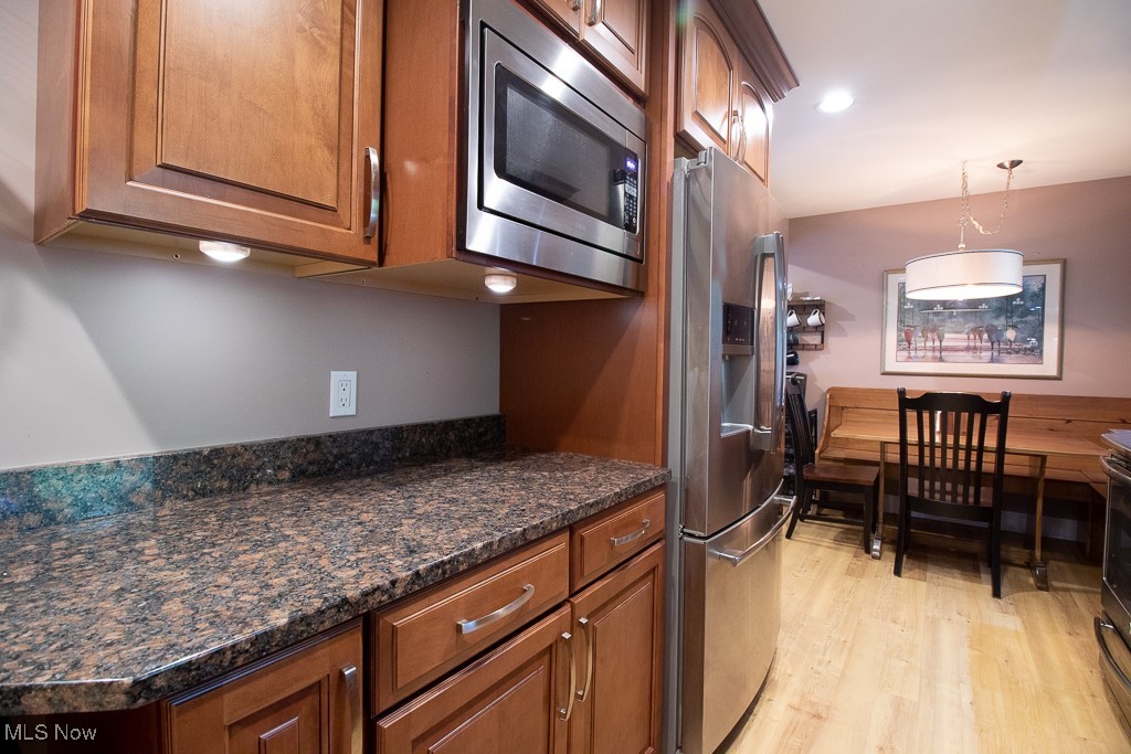 27230 Highland Road Cleveland, OH 44143 - Photo 21 of 41 Newer cabinets stainless steel appliances and granite countertops