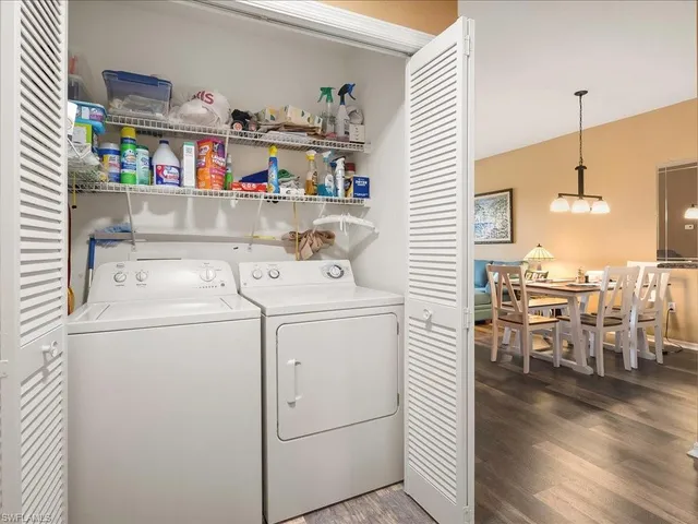 a utility room with dryer and washer