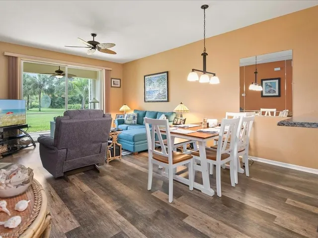 a dining room with furniture window wooden floor