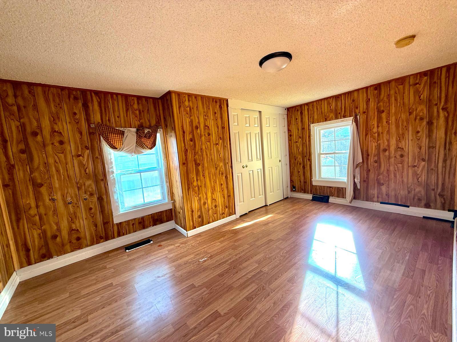 73 Maple Avenue Cedarville, NJ 08311 - Photo 12 of 25 a view of a room with wooden floor and windows