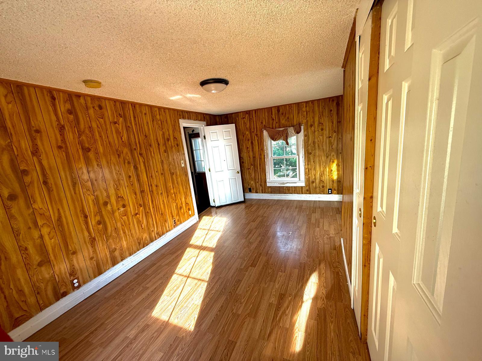 73 Maple Avenue Cedarville, NJ 08311 - Photo 13 of 25 a view of a room with wooden floor and stairs
