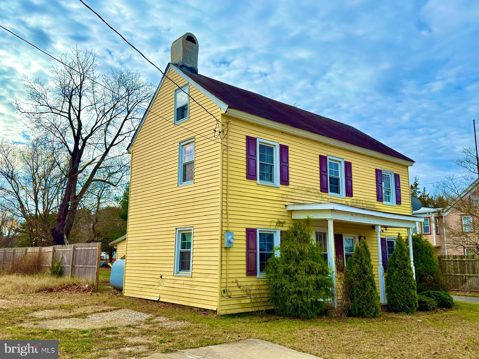 73 Maple Avenue Cedarville, NJ 08311 - Photo 2 of 25 a front view of a house with a yard
