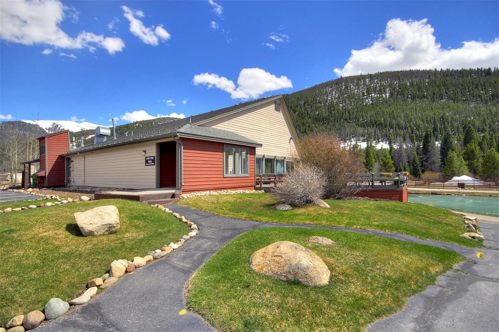22138 Highway 6, Unit 1553 Keystone, CO 80435 - Photo 34 of 43 a swimming pool with outdoor seating and yard