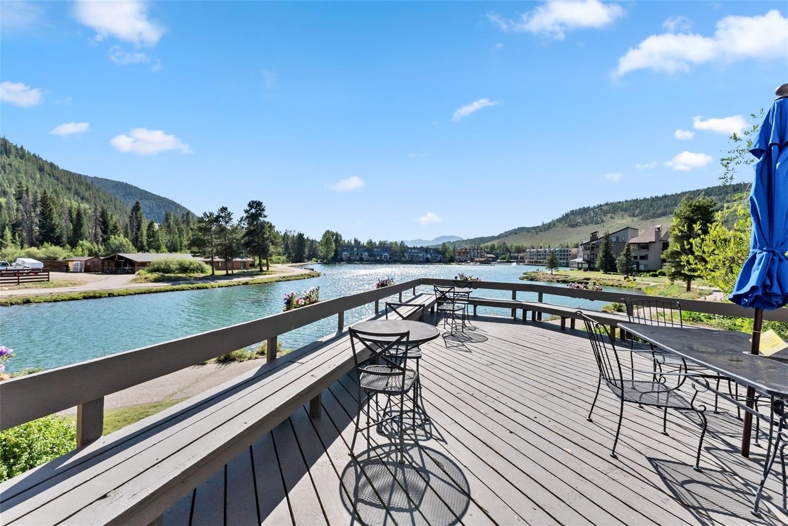 22138 Highway 6, Unit 1553 Keystone, CO 80435 - Photo 40 of 43 a view of swimming pool with outdoor seating and city view