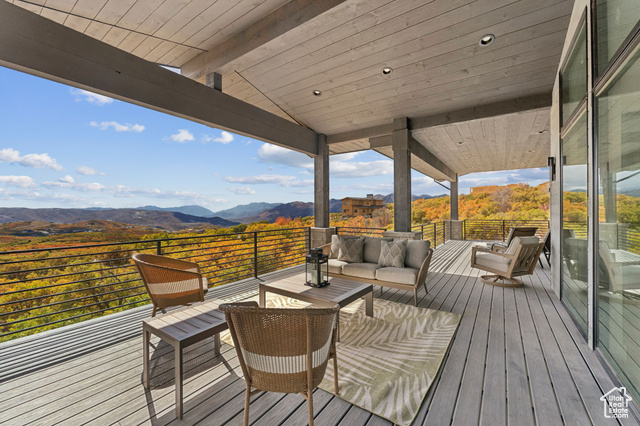 2280 East Outlaw Road, Unit 56 Kamas, UT 84036 - Photo 55 of 59 Deck with a mountain view and an outdoor living space