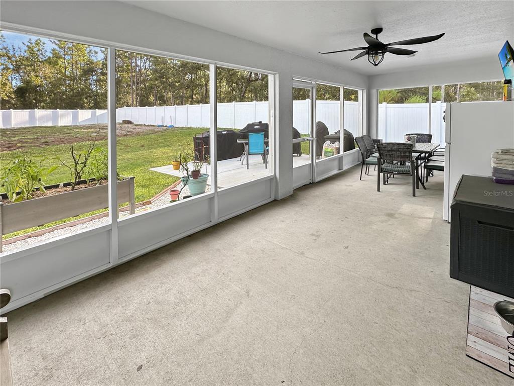 13023 Downy Woodpecker Road Weeki Wachee, FL 34614 - Photo 31 of 43 a view of room with window and furniture