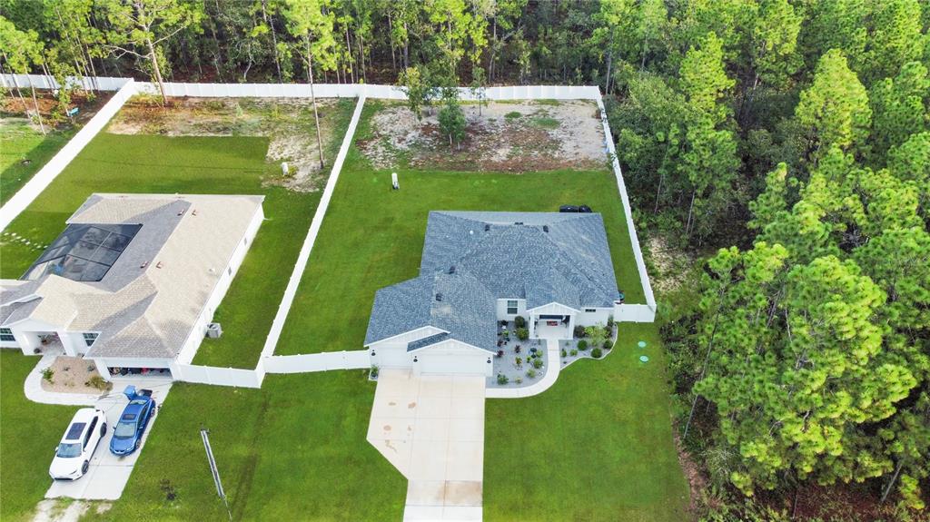 13023 Downy Woodpecker Road Weeki Wachee, FL 34614 - Photo 6 of 43 an aerial view of a house