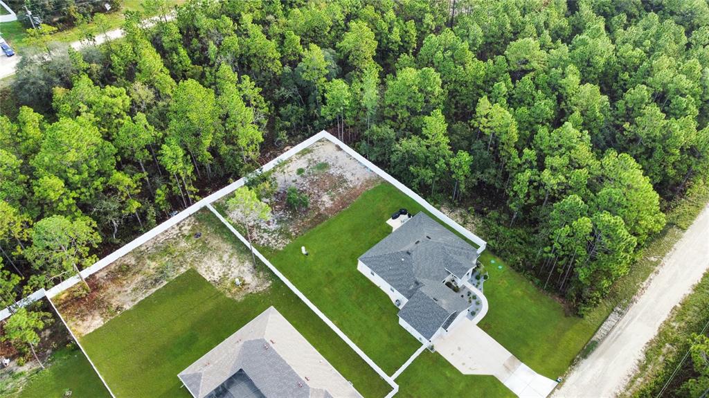 13023 Downy Woodpecker Road Weeki Wachee, FL 34614 - Photo 7 of 43 an aerial view of a house