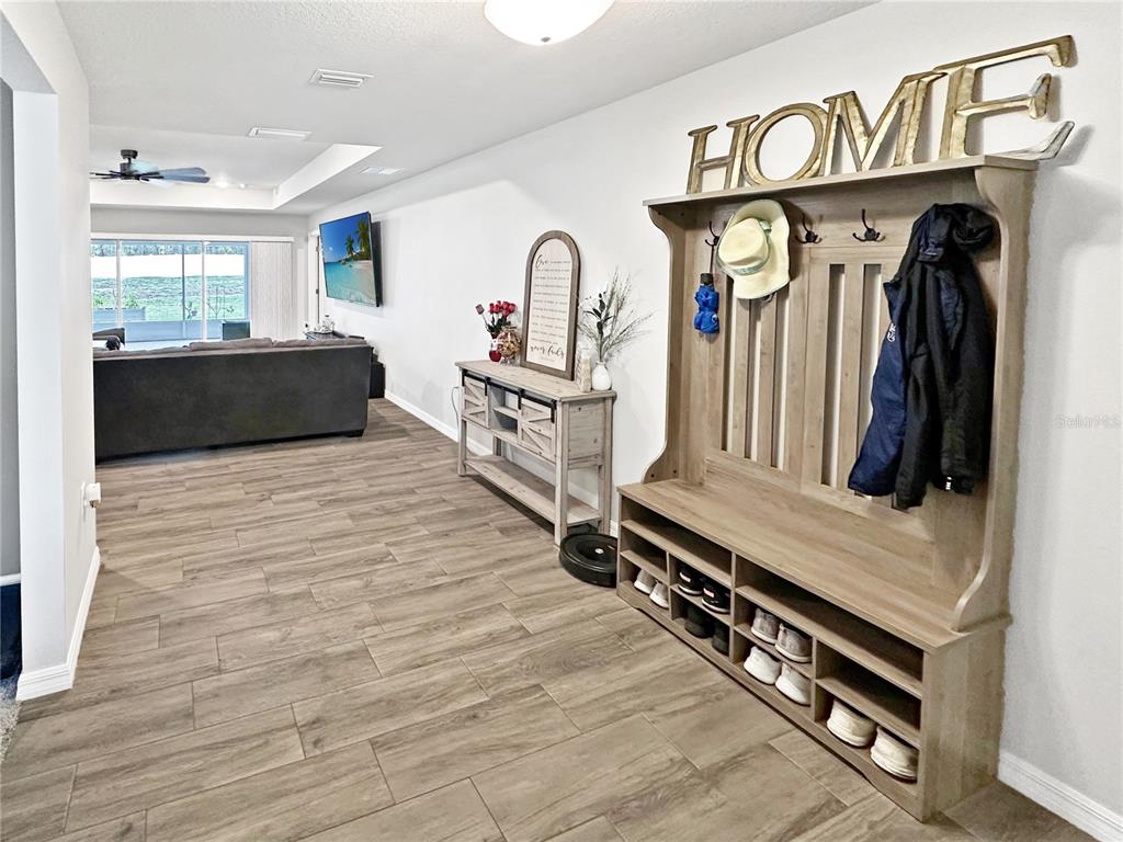13023 Downy Woodpecker Road Weeki Wachee, FL 34614 - Photo 8 of 43 a living room with furniture