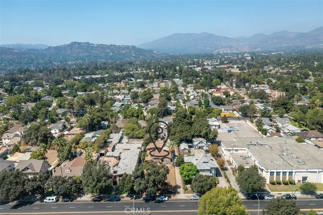 an aerial view of residential houses and street space