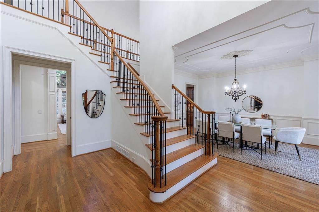 2893 Thurleston Lane Duluth, GA 30097 - Photo 11 of 53 a view of entryway dining room and hall with wooden floor