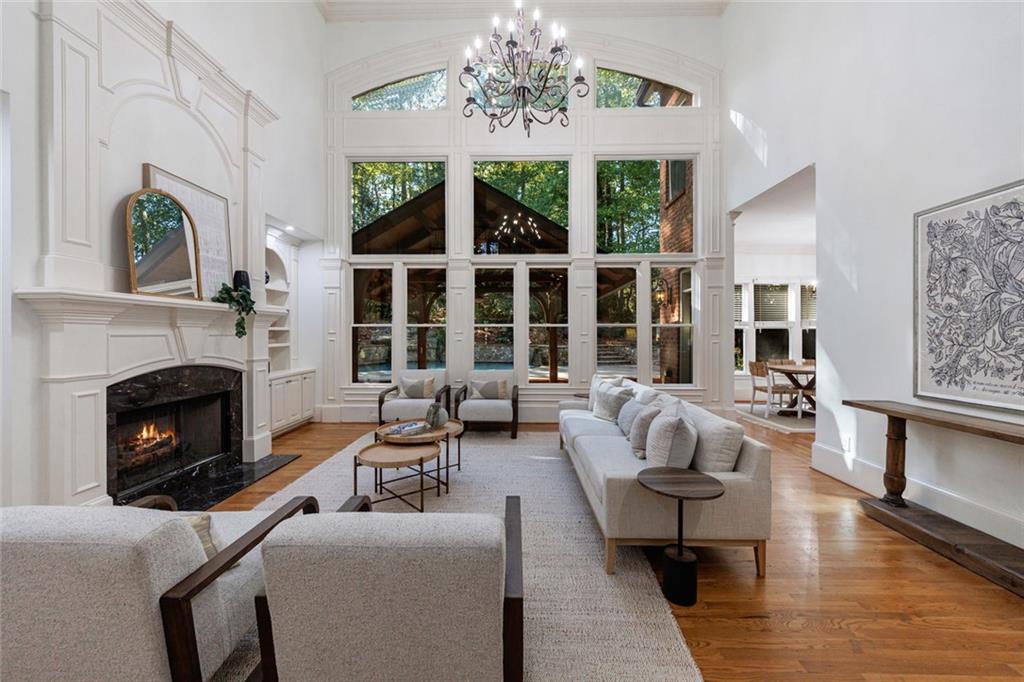 2893 Thurleston Lane Duluth, GA 30097 - Photo 15 of 53 a living room with furniture fireplace and window