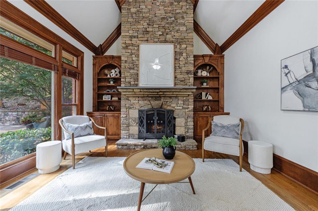 2893 Thurleston Lane Duluth, GA 30097 - Photo 25 of 53 a living room with furniture and a fireplace