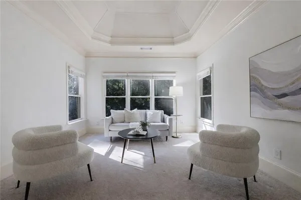 a bathroom with a granite countertop tub sink shower and mirror