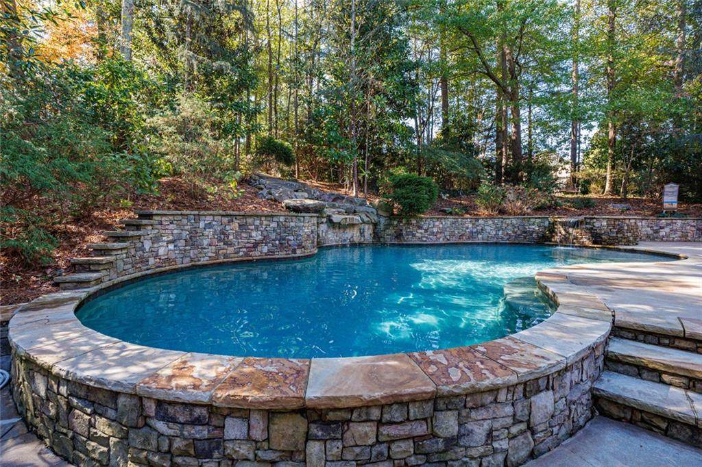 2893 Thurleston Lane Duluth, GA 30097 - Photo 4 of 53 a view of a swimming pool with a patio