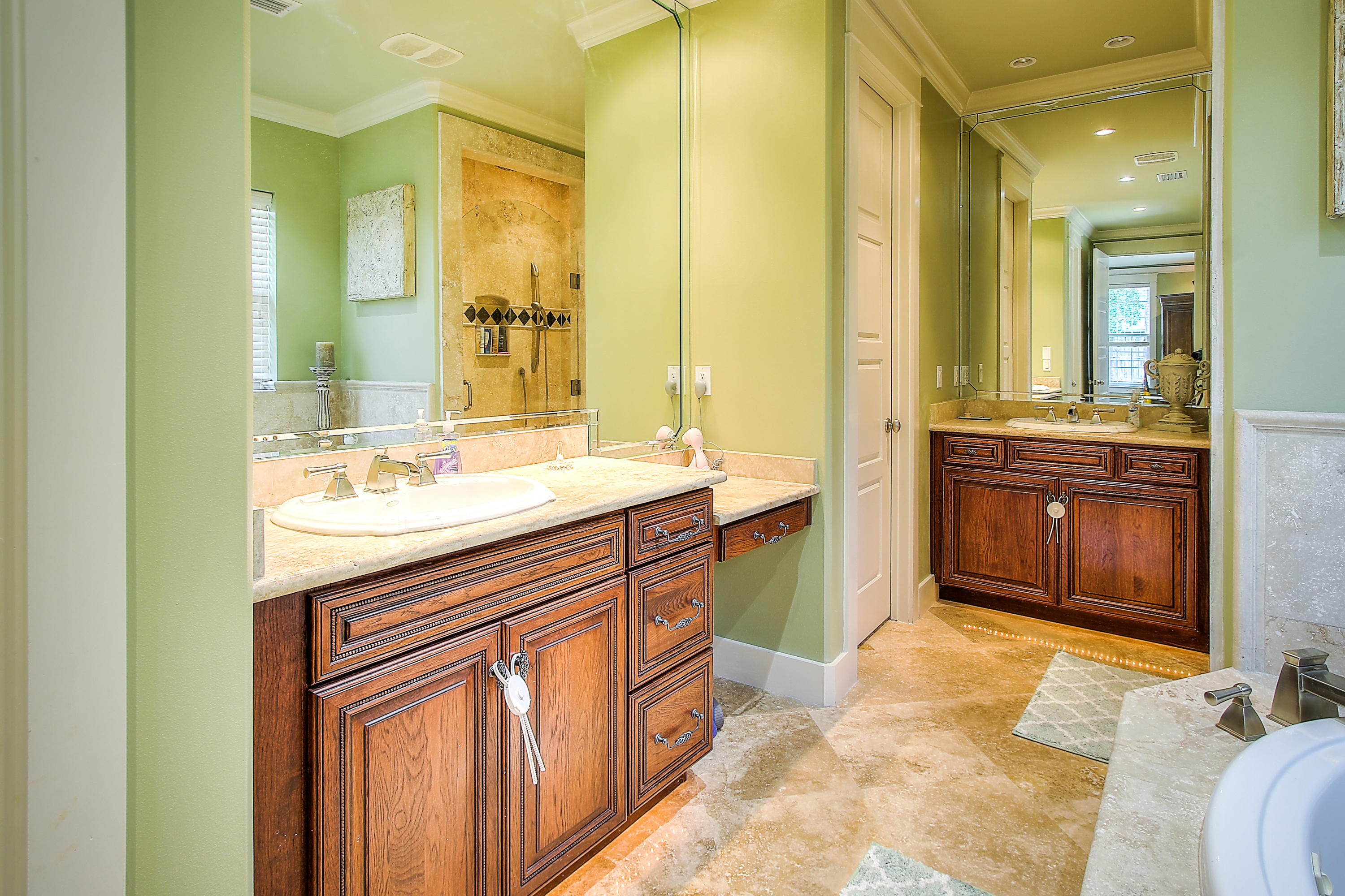 512 West Harborview Road Santa Rosa Beach, FL 32459 - Photo 15 of 40 a spacious bathroom with a granite countertop sink and a mirror