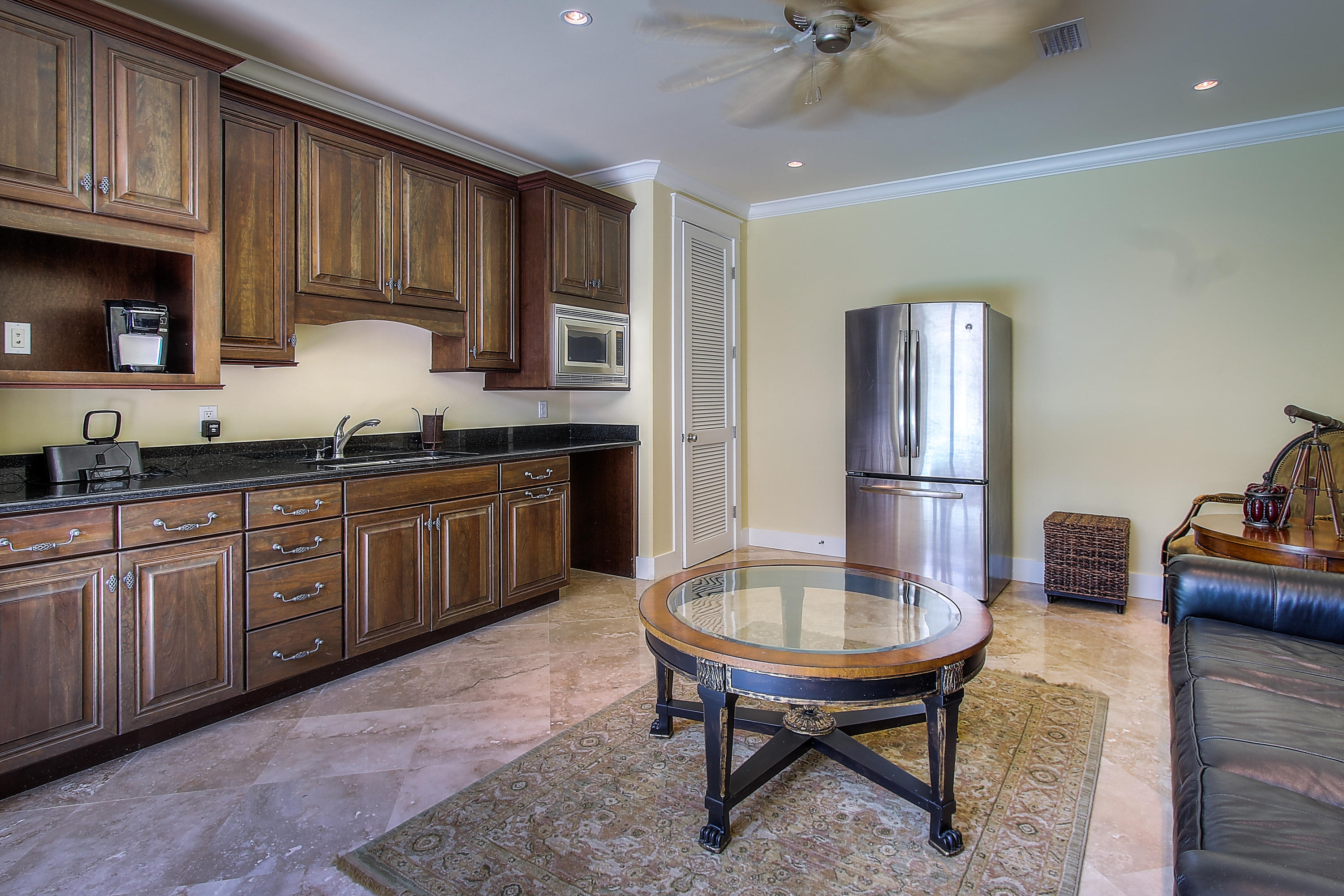 512 West Harborview Road Santa Rosa Beach, FL 32459 - Photo 36 of 40 a kitchen with sink cabinets and window
