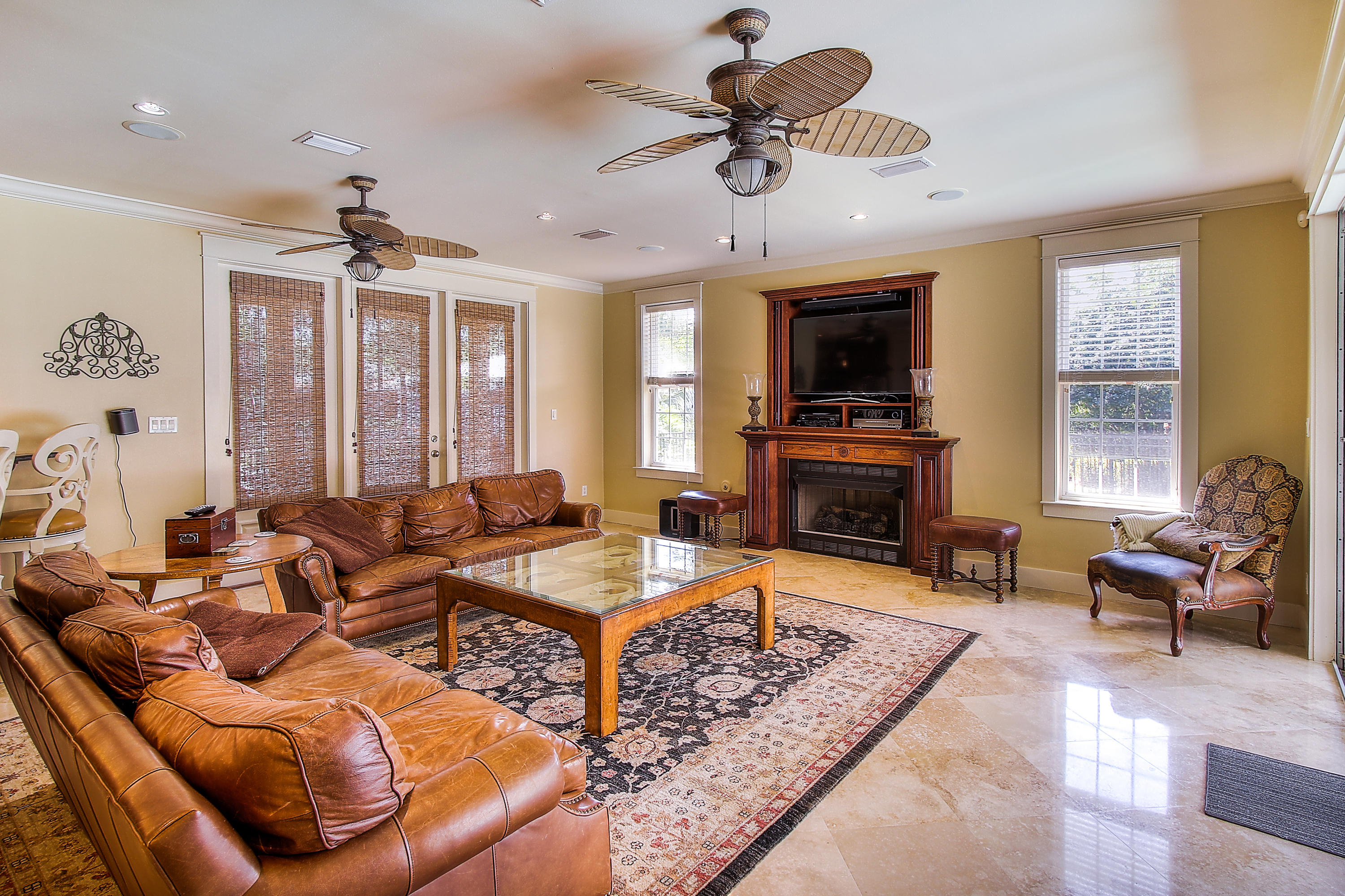 512 West Harborview Road Santa Rosa Beach, FL 32459 - Photo 7 of 40 a living room with furniture fireplace and flat screen tv