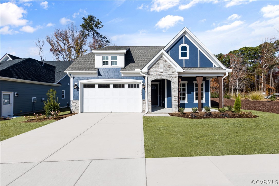12231 Twin Rivers Drive Chester, VA 23836 - Photo 1 of 2 a view of house with yard and outdoor seating