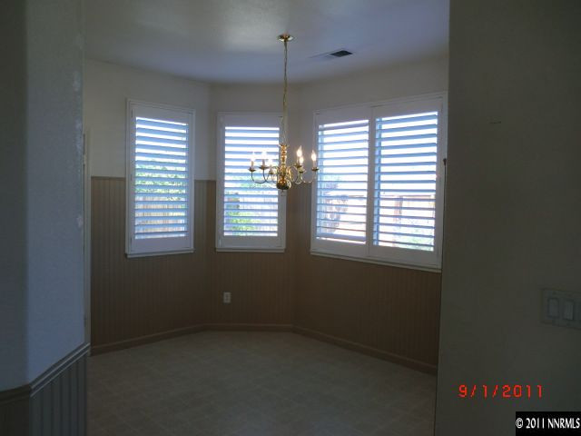 10640 Vista Bella Lane Reno, NV 89521 - Photo 3 of 13 a view of an empty room with a window