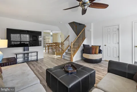 a bathroom with a sink a mirror and a window