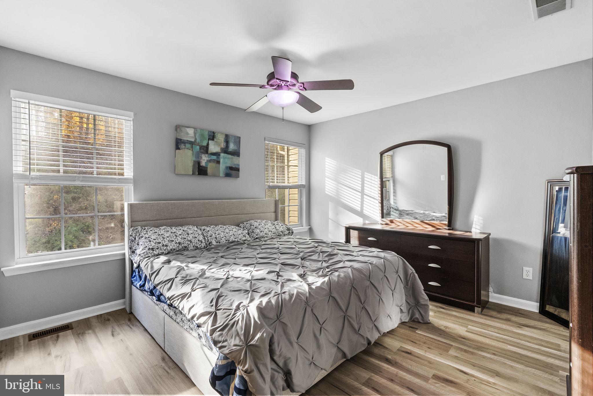 27 Branford Way Coatesville, PA 19320 - Photo 25 of 44 a bedroom with a large bed and a window