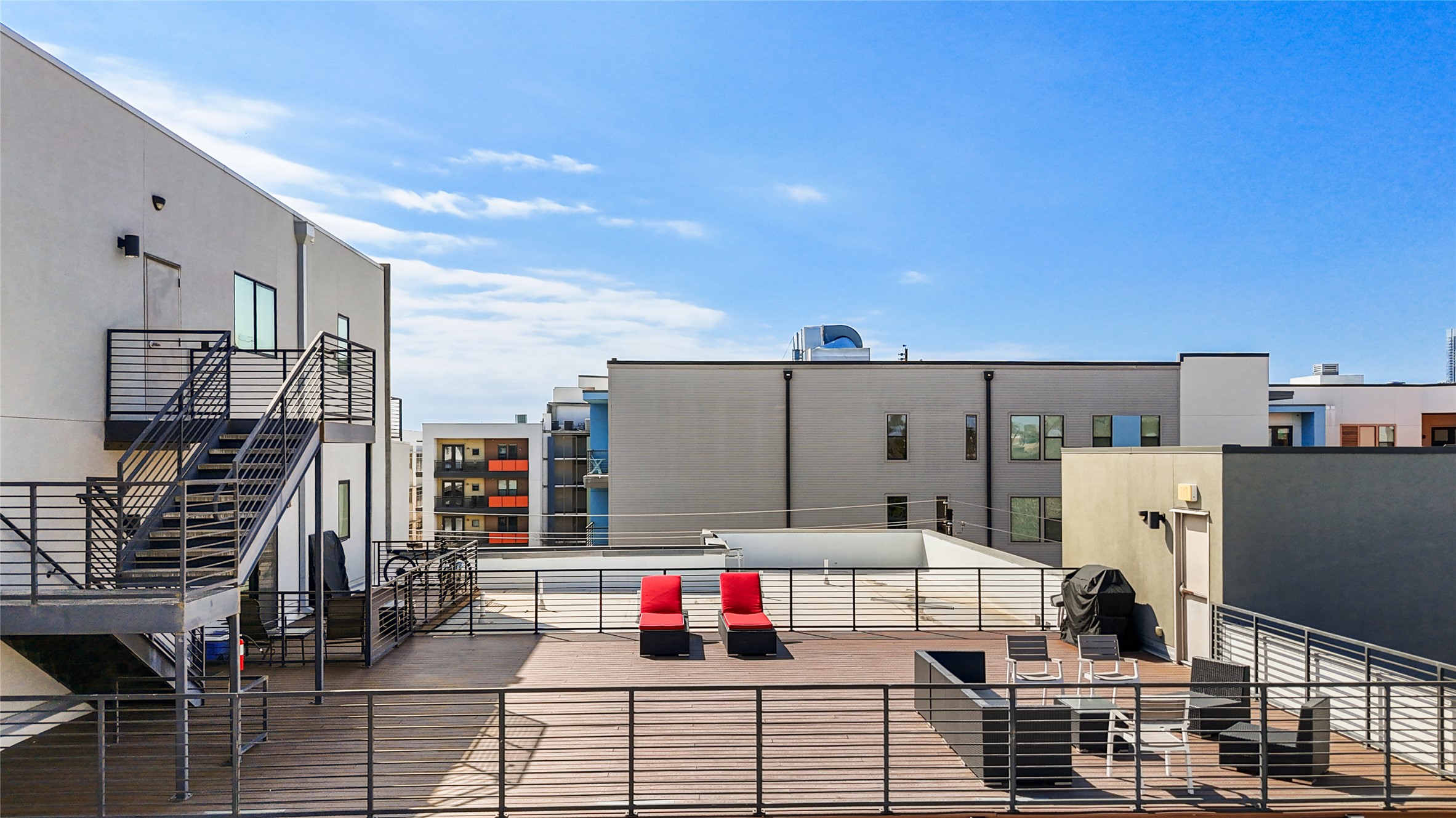 1615 East 7th Street, Unit 208 Austin, TX 78702 - Photo 23 of 30 View of patio / terrace with an outdoor lounge area and a grill