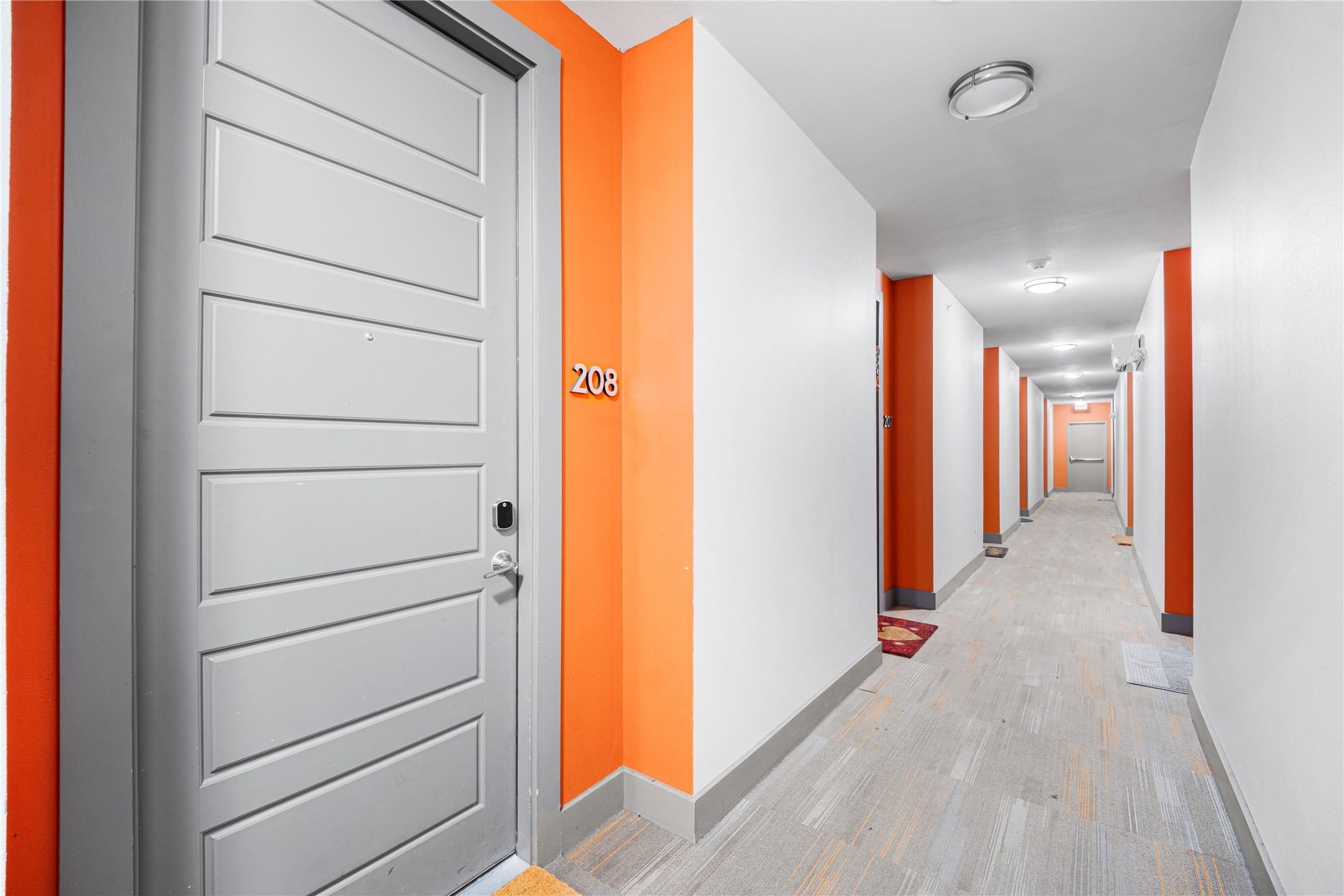 1615 East 7th Street, Unit 208 Austin, TX 78702 - Photo 25 of 30 Hall with baseboards