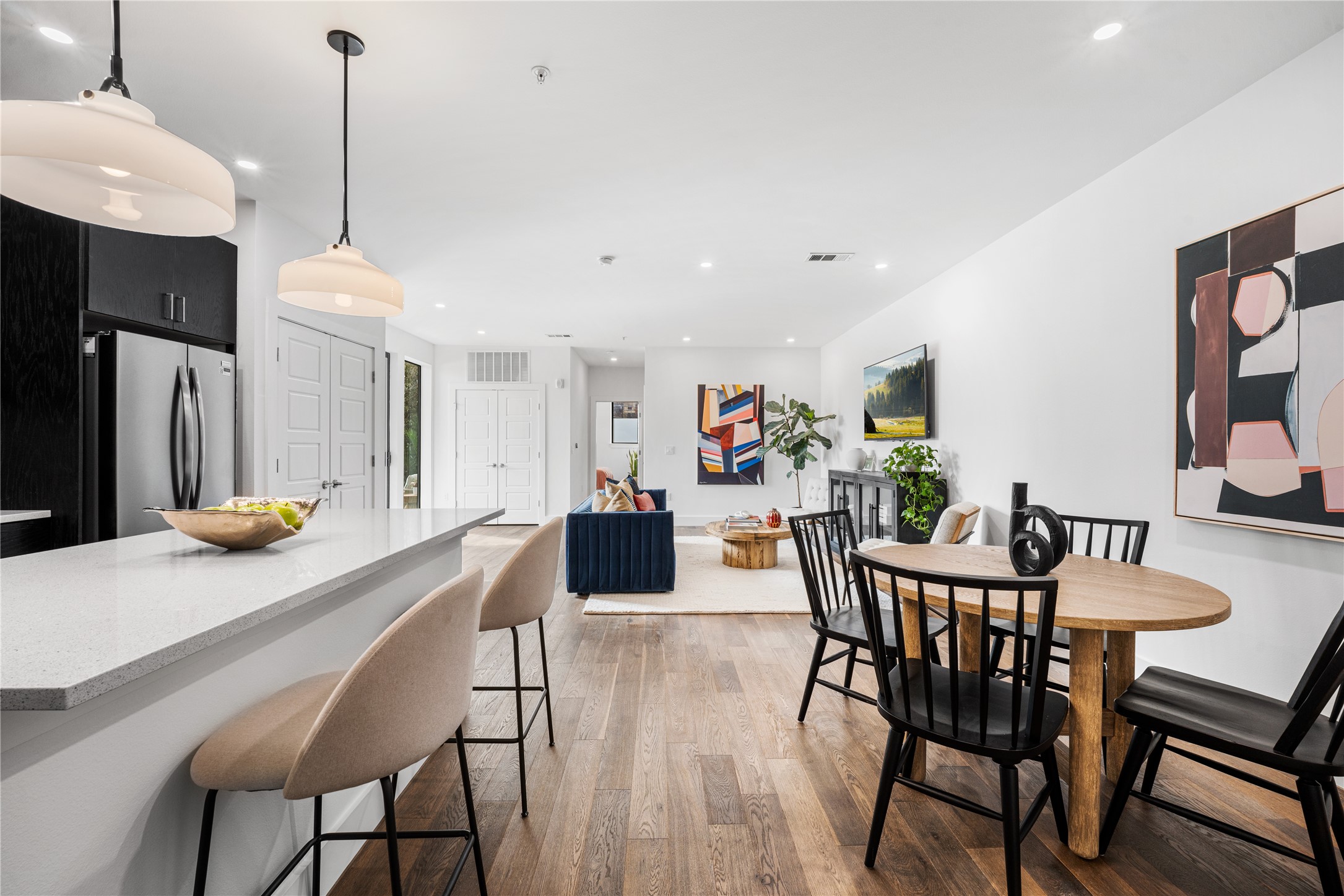 1615 East 7th Street, Unit 208 Austin, TX 78702 - Photo 3 of 30 Dining room featuring light wood-type flooring and recessed lighting