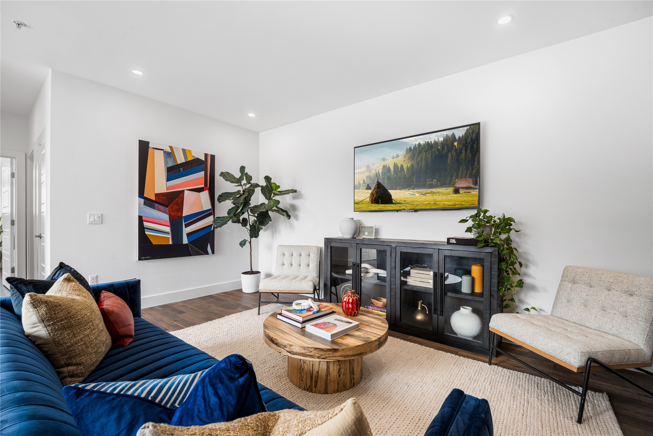 1615 East 7th Street, Unit 208 Austin, TX 78702 - Photo 10 of 30 Living area featuring wood finished floors and recessed lighting