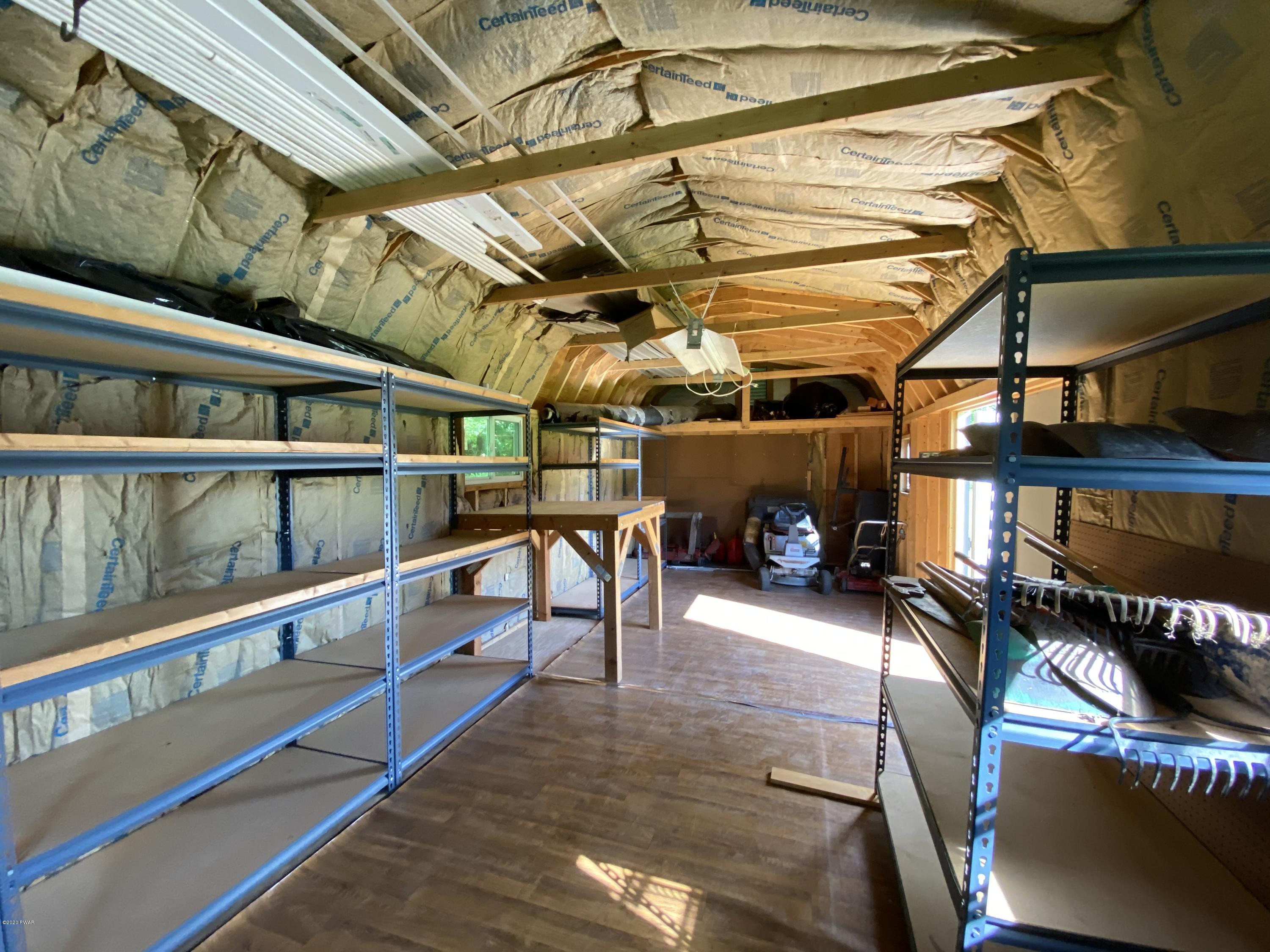 283 Mill Brook Road Waymart, PA 18472 - Photo 25 of 30 a view of a garage with furniture