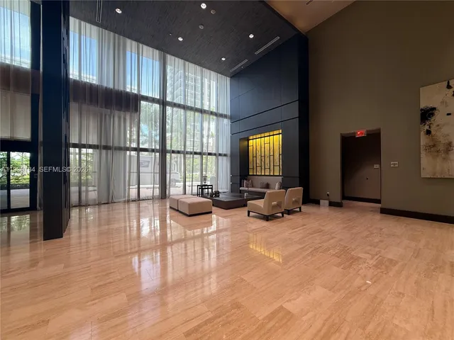 a view of a living room with a wooden floor